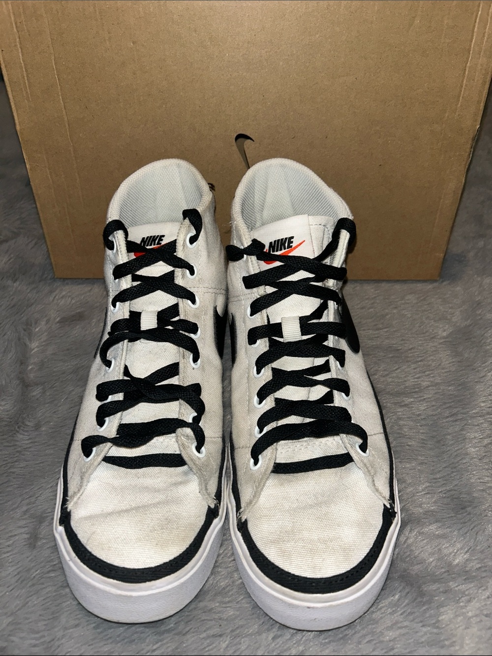 Nike Women’s White and Black Canvas High-Top Sneakers
